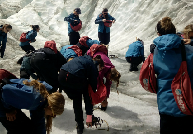 Franz Josef putting crampons on